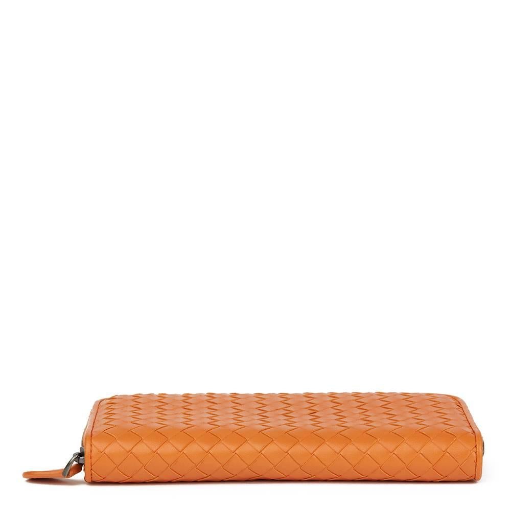 2015 Bottega Veneta Orange Woven Calfskin Leather Zip Around Wallet In Good Condition In Bishop's Stortford, Hertfordshire