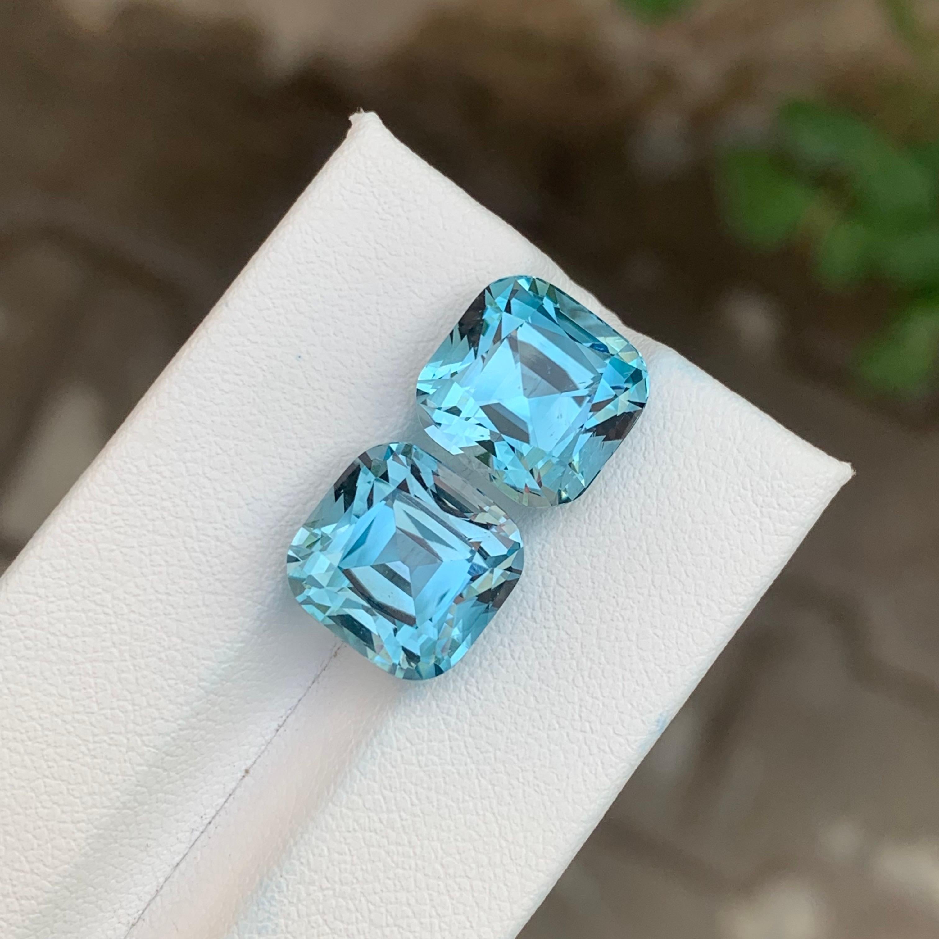 Loose Sky Blue Topaz Pair 

Weight: 20.10 Carats 
Dimensions : 11.1 x 10.8 x 9.5 Mm Or 
                       11.2 x 10.9 x 9.3 Mm 
Origin: Brazil
Shape: Cushion
Color: Blue
Certificate: On Demand

Benefits Of Wearing Sky Blue Topaz Stone:
It helps
