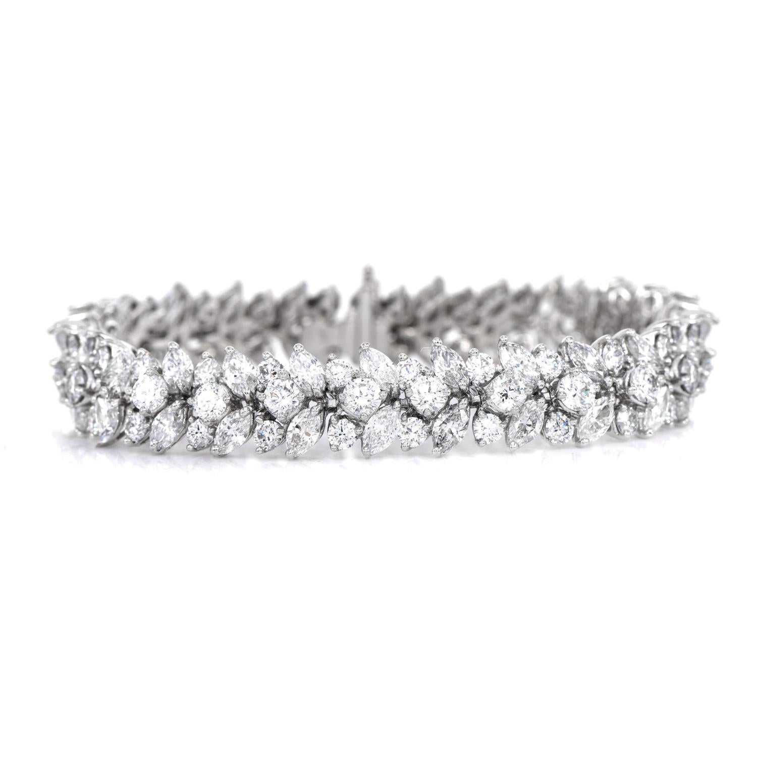 Fire, Sparkle, and Brilliance all radiate from this Marquise Diamond Floral-inspired Bracelet.

Crafted in Luxurious Platinum, this bracelet contains (52) ideally matched Marquise diamonds & (81) Round Cut 

prong Set, natural Diamonds,

Total