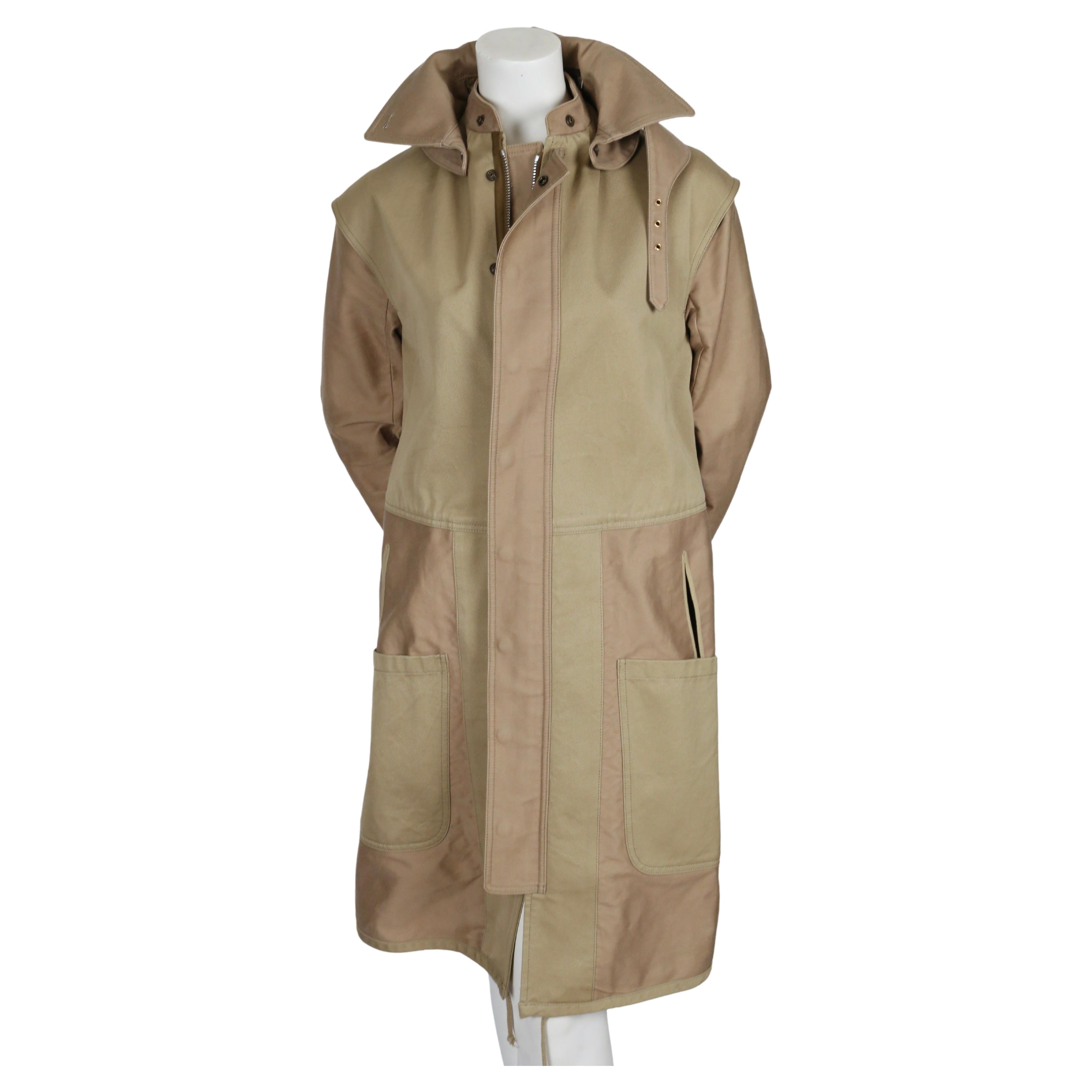 Very rare, khaki cotton oversized coat designed by Phoebe Philo for Celine dating to resort of 2010. Labeled a French size 36, however it fits oversized. Approximate measurements: dropped shoulder 19