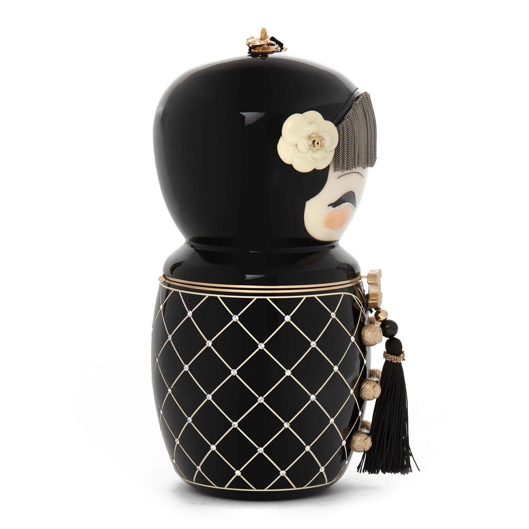 CHANEL
Black Plexiglass & Enamel Paris-Shanghai China Doll Minaudiere 

Reference: CB153
Age (Circa): 2010
Accompanied By: Chanel Dust Bag, Box
Authenticity Details: (Made in France)  - This item was aquired as a staff gift.
Gender: Ladies
Type: