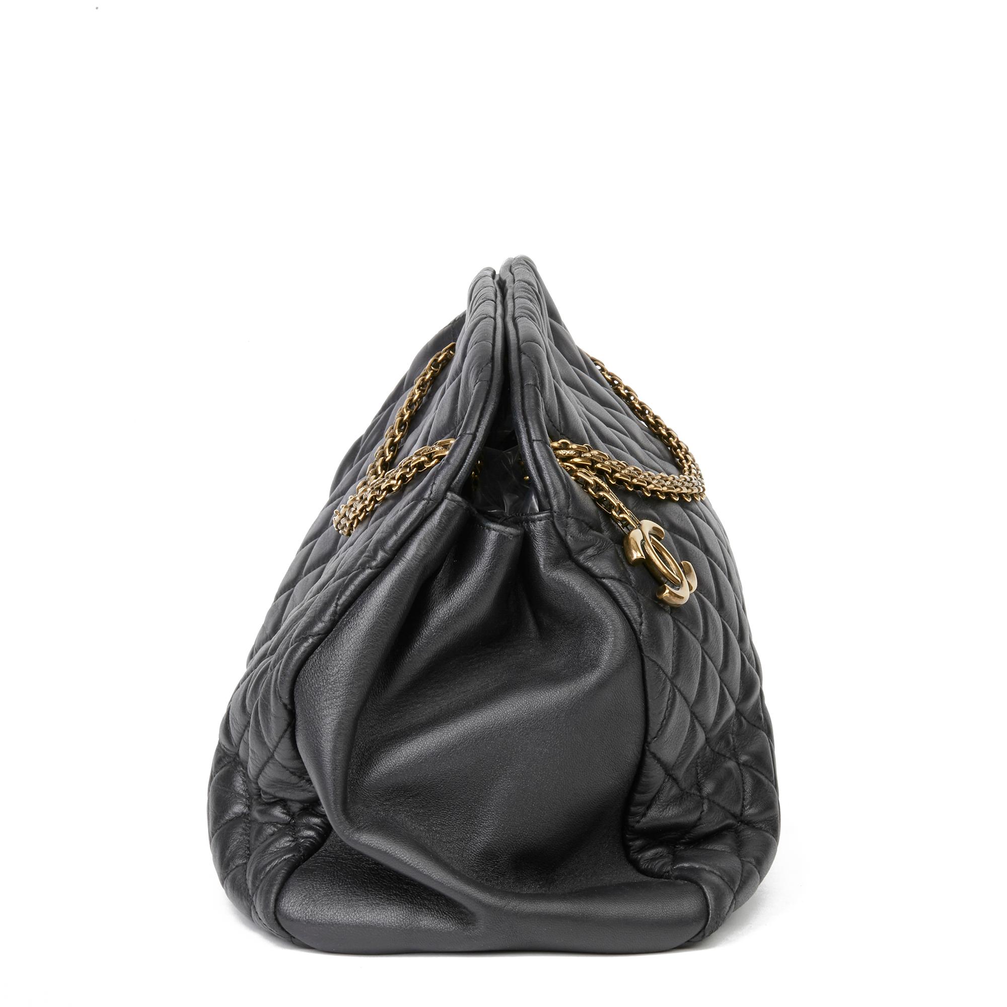 CHANEL
Black Quilted Lambskin Large Just Mademoiselle Bowling Bag

Xupes Reference: HB3366
Serial Number: 14158424
Age (Circa): 2010
Authenticity Details: Serial Sticker (Made in Italy)
Gender: Ladies
Type: Shoulder

Colour: Black
Hardware: Antiqued