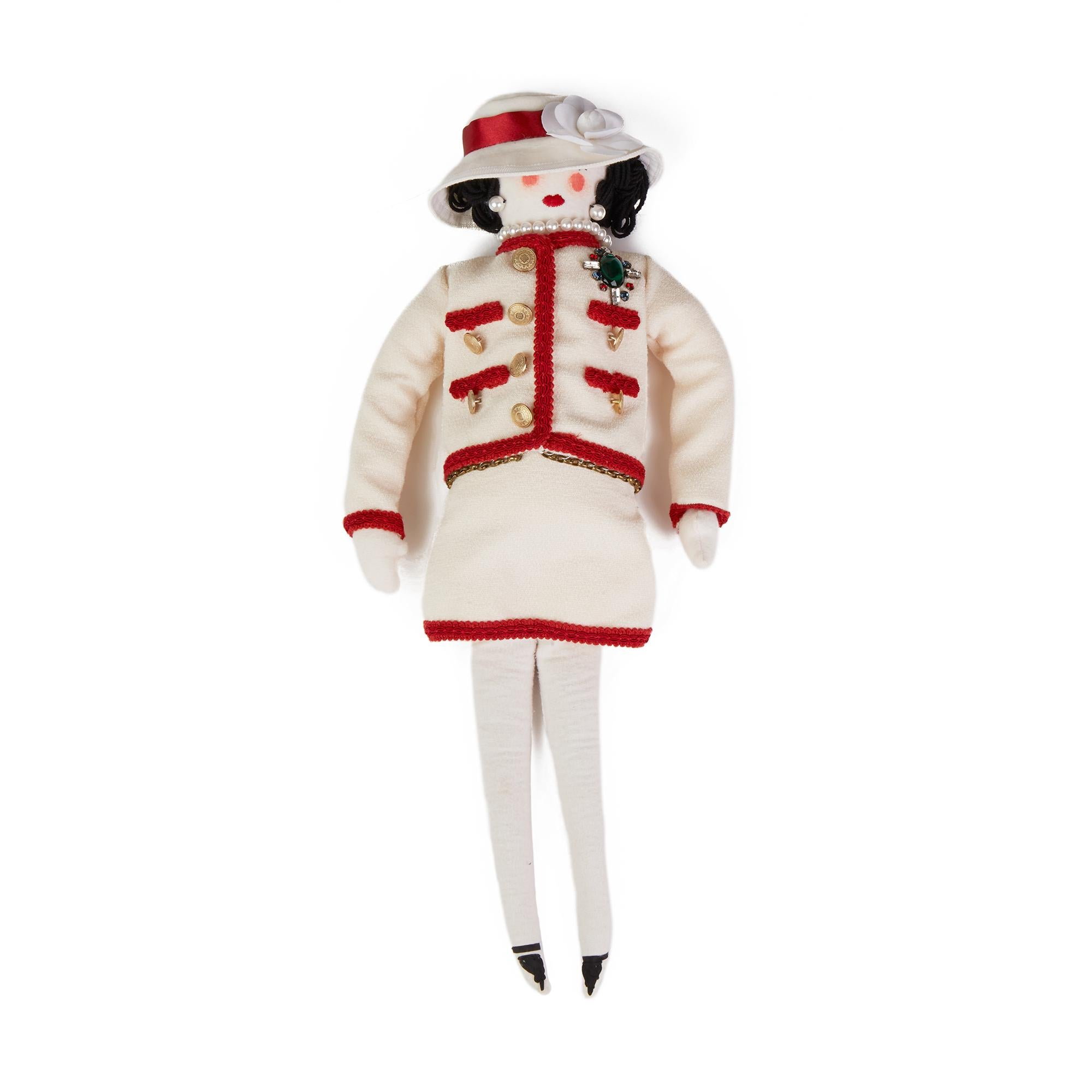 CHANEL
Fabric Coco Madamoiselle Doll by Karl Largerfeld

Xupes Reference: CB215
Serial Number: X
Age (Circa): 2010
Accompanied By: Chanel Box 
Gender: Ladies
Type: Accesory

Colour: Multicolour
Hardware: Gold
Material(s): Fabric

Height: 55cm
Width: