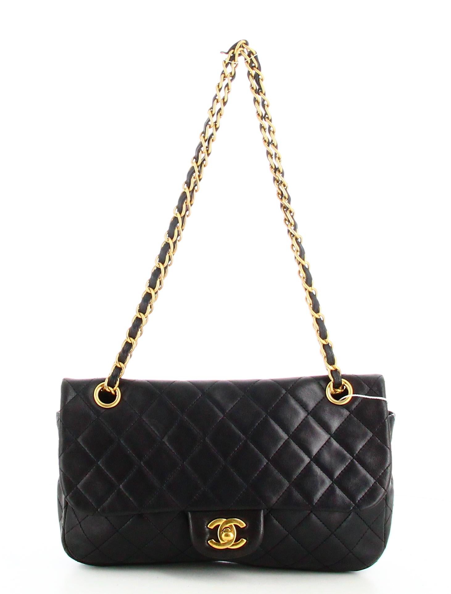 2010 Chanel Medium Classic Lambskin Single Flap Handbag

- Very good condition. Shows very slight signs of wear over time. 
- Chanel Handbag 
- Black quilted leather 
- Golden double chain 
- Clasp: Double C golden 
- Interior: Black leather plus