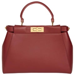 Used 2010 Fendi  Cherry Red Calfskin Leather Regular Peekaboo