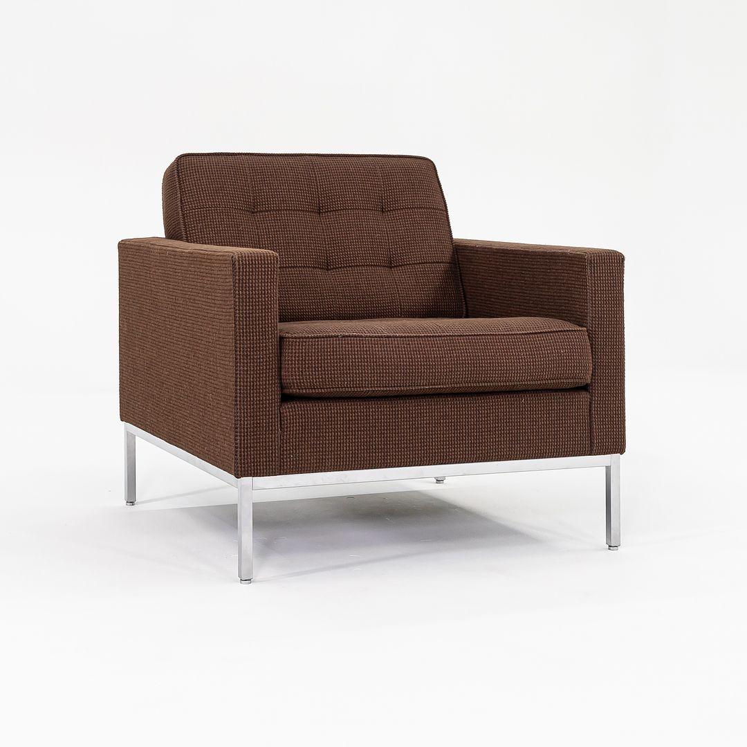 This is an original Florence Knoll Lounge Chair, Model 1205S1, designed by Florence Knoll for Knoll in 1954. This particular example was produced by Knoll Studio in the USA in 2010. It features an exposed square tubular-steel frame, and is