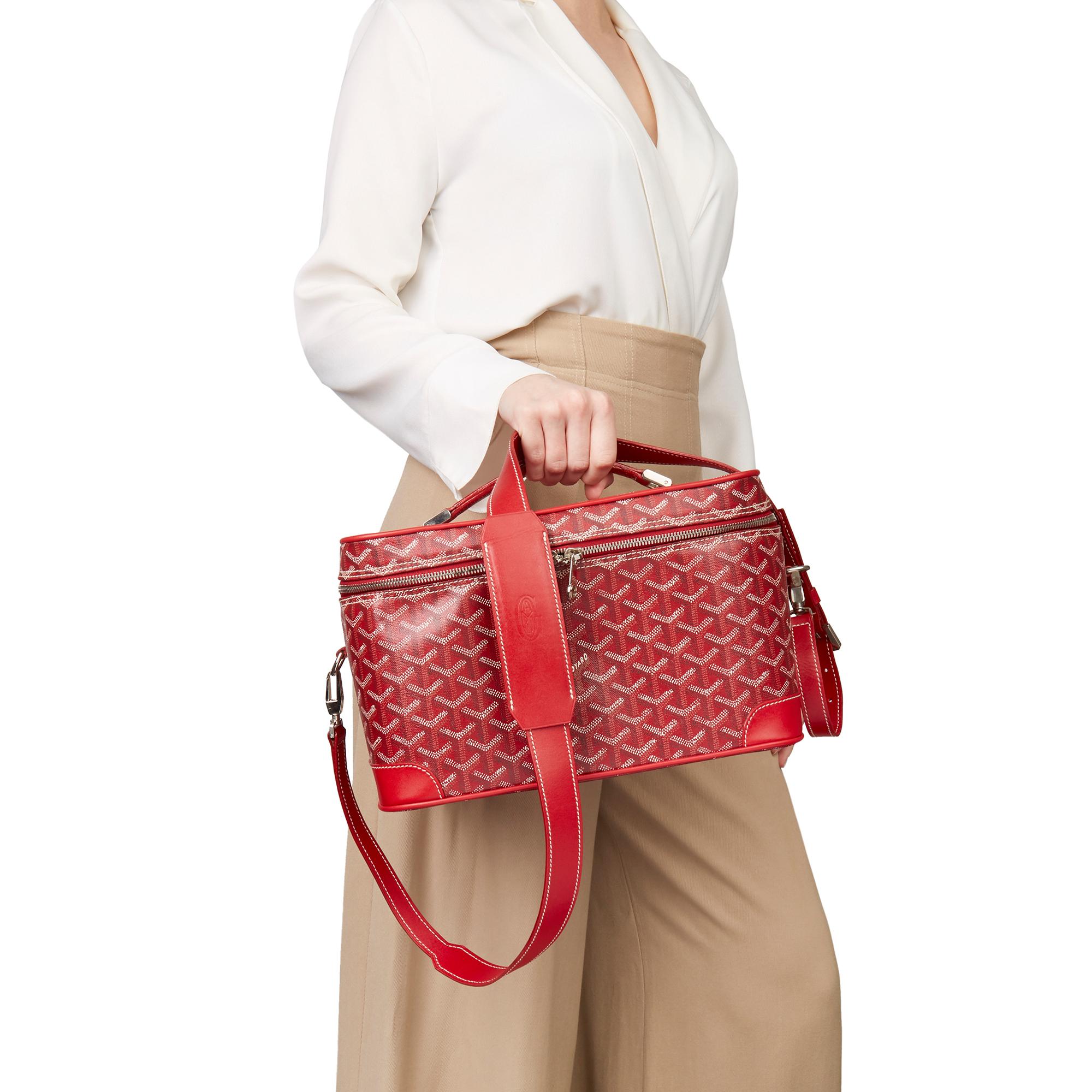 GOYARD
Red Chevron Canvas Train Case

Xupes Reference: HB3302
Serial Number: GOS020045
Age (Circa): 2010
Accompanied By: Padlock, Keys, Shoulder Strap
Authenticity Details: Date Stamp (Made in France)
Gender: Ladies
Type: Travel, Shoulder, Top