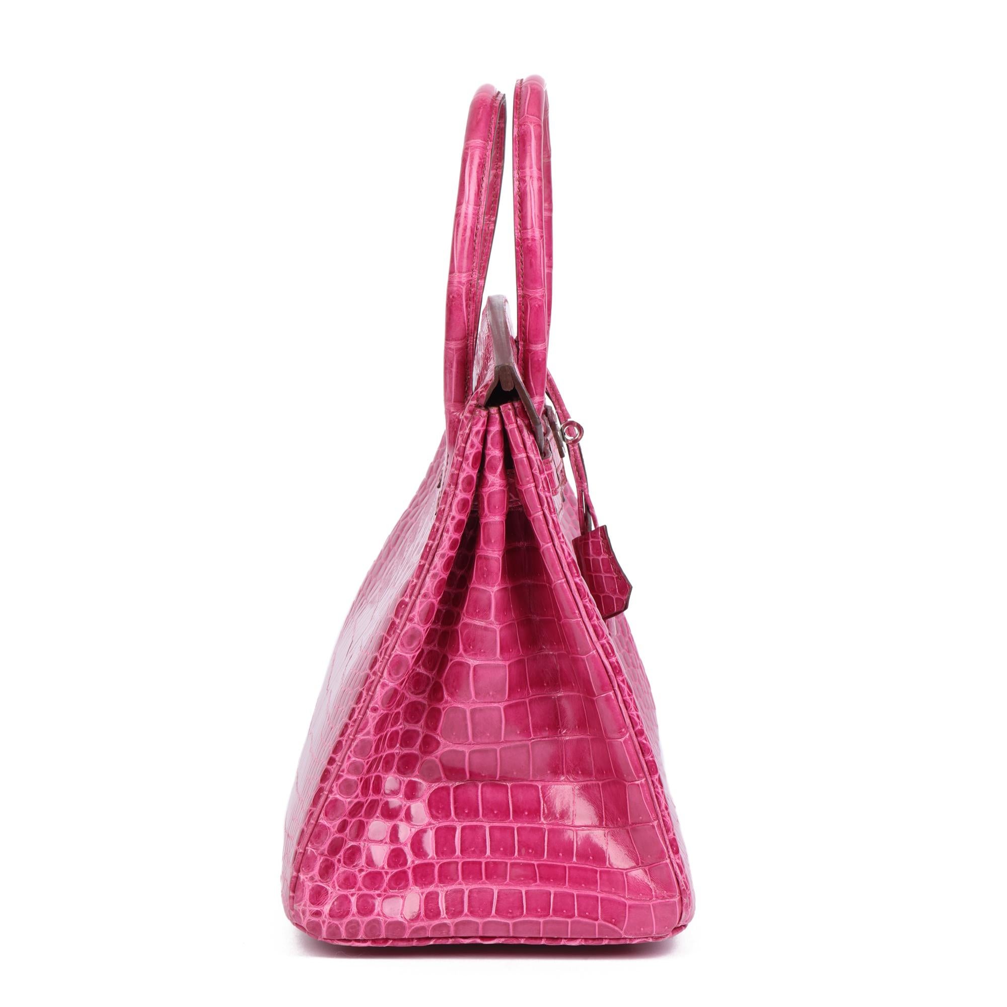 HERMÈS
Fuschia Shiny Porosus Crocodile Leather Birkin 35cm Retourne

Xupes Reference: CB476
Serial Number: [N]
Age (Circa): 2010
Accompanied By: Hermès Dust Bag, Lock, Keys, Clochette
Authenticity Details: Date Stamp (Made in France)
Gender: