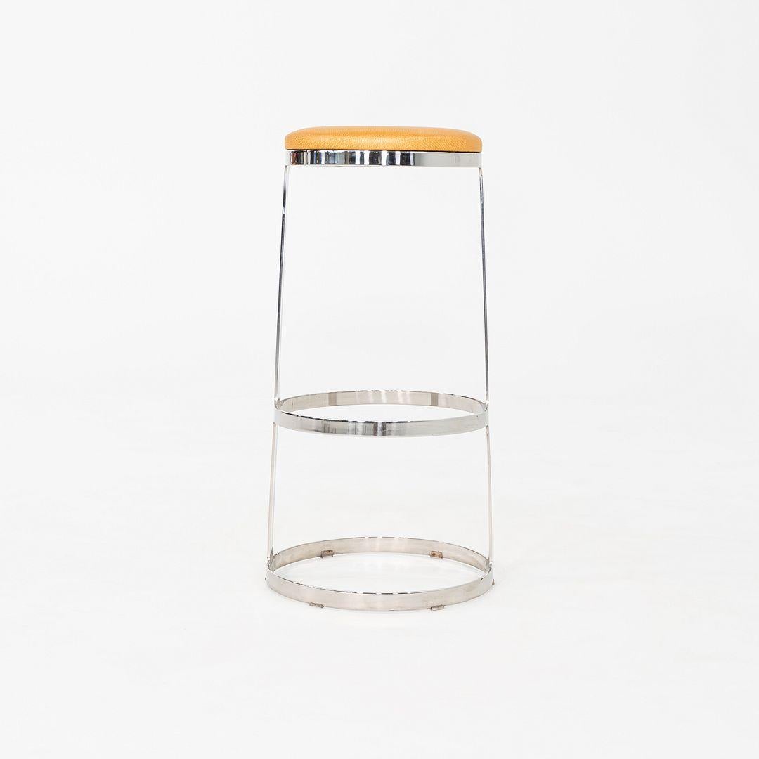 These are Aro Bar Stools, originally designed by Alberto Lievore, Jeannette Altherr and Manel Molina in 1991. These particular examples were produced by Bernhardt Design in the United States and date back to 2010. Their design is comprised of a