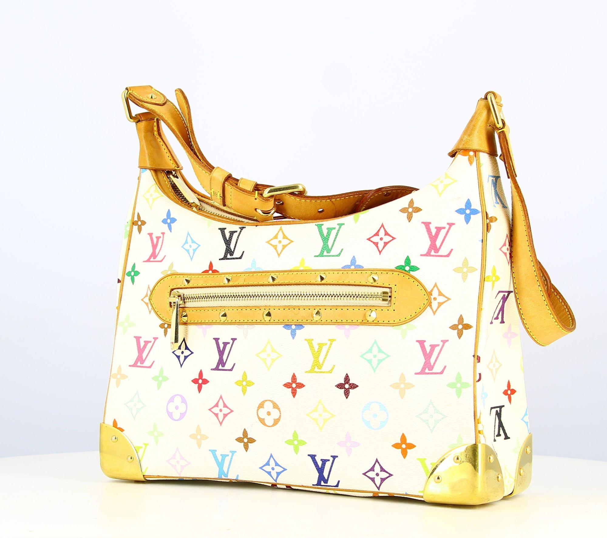 2010 Boulogne Handbag Louis Vuitton Multicolor
- Good condition, shows slight wear and tear over time
- Louis Vuitton Multicolor Boulogne handbag, brown leather straps, LV multicolor logo, golden plated zip fastener, small pocket on the back of the