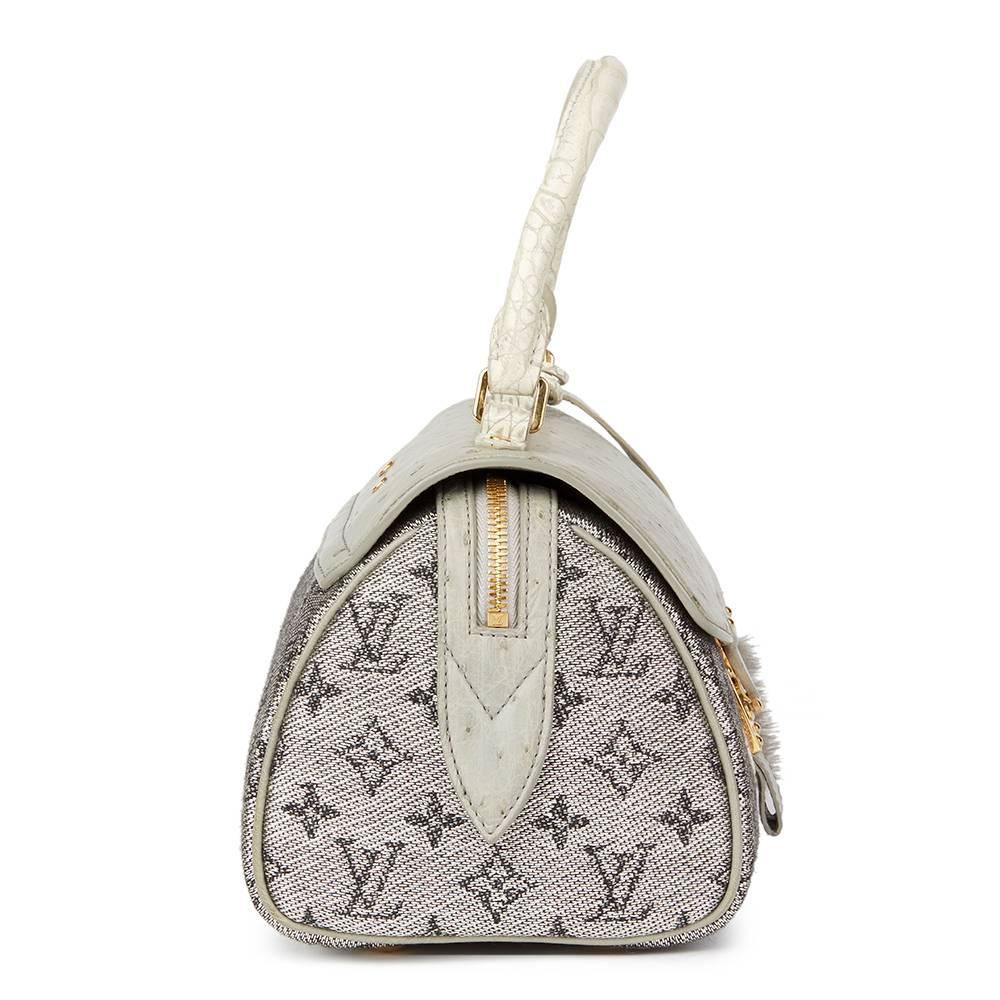 LOUIS VUITTON
Grey Alligator Leather, Ostrich Leather & Mink, Jacquard Monogram Comedie Carrousel

Reference: HB1650
Serial Number: RC3150
Age (Circa): 2010
Accompanied By: Louis Vuitton Dust Bag, Lock, Keys, Clochette, Care Booklet, Tag, Bag