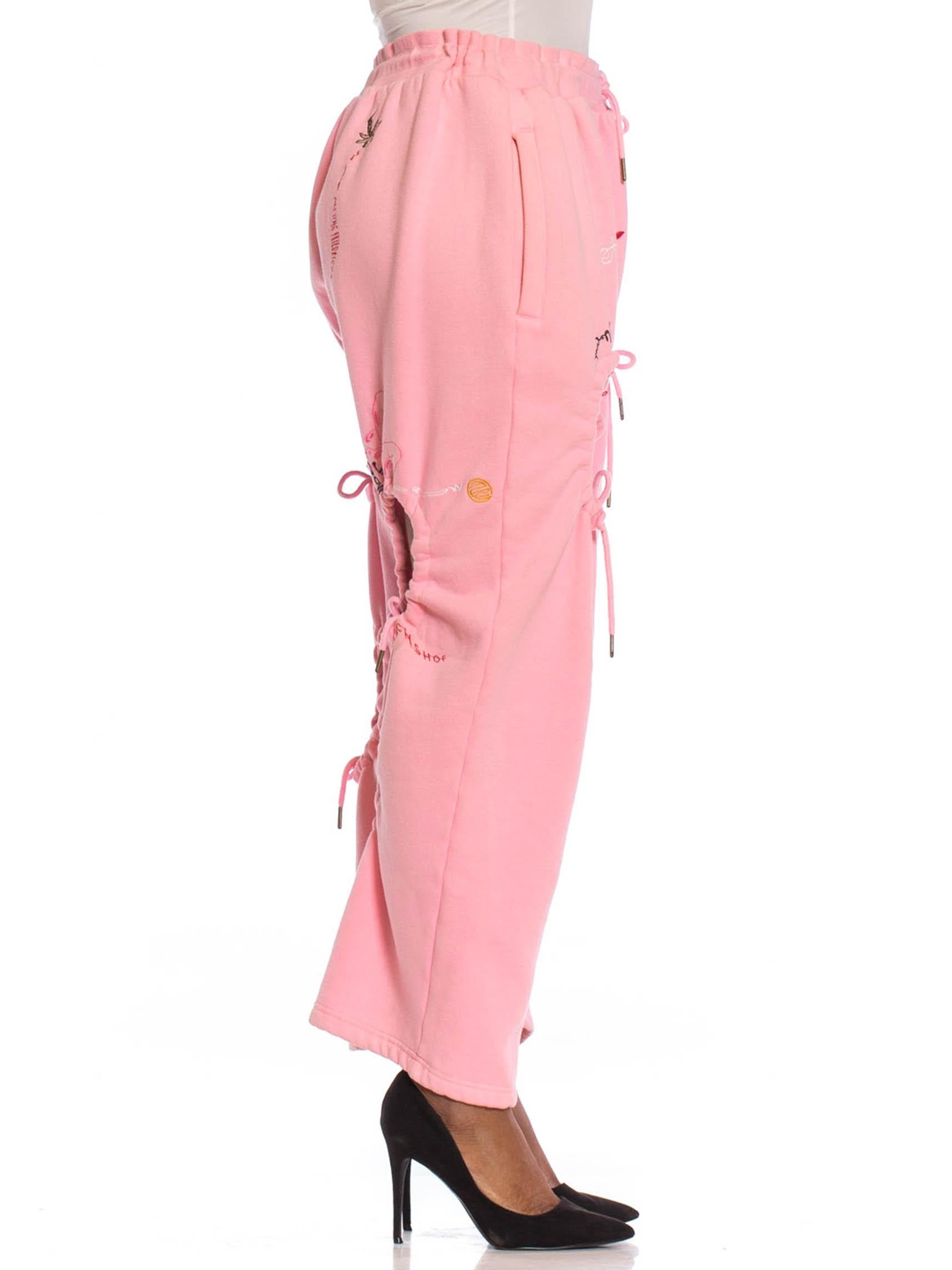 2010S Baby Pink Sweat Pants With Graffiti Embroidery And Decorative Holes 1