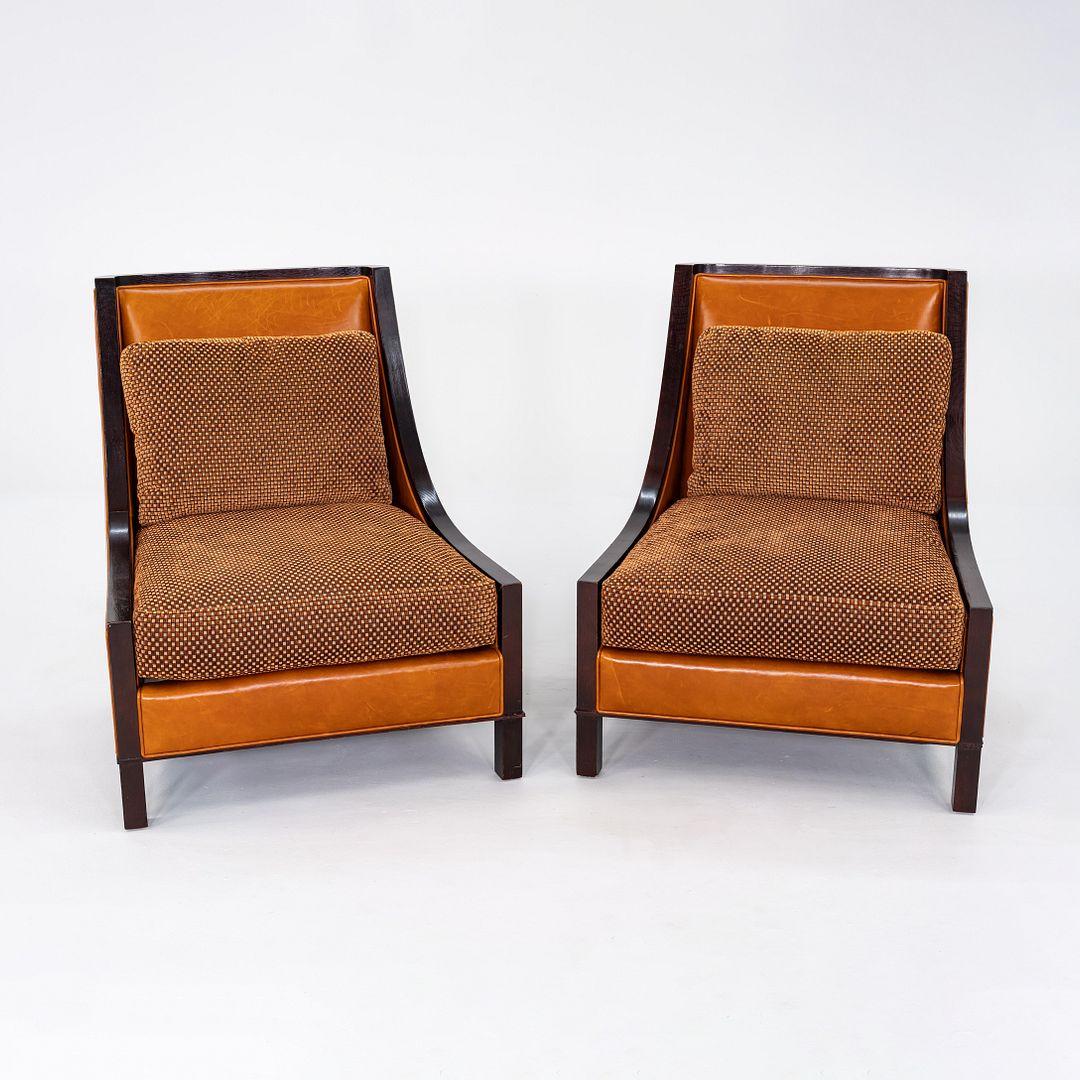 This is a Slipper Lounge Chair, originally designed by Barbara Barry for Baker in the early 2000s. This particular example was produced in the 2010s. The chair features a refined silhouette with low, elegant proportions and is upholstered in rich