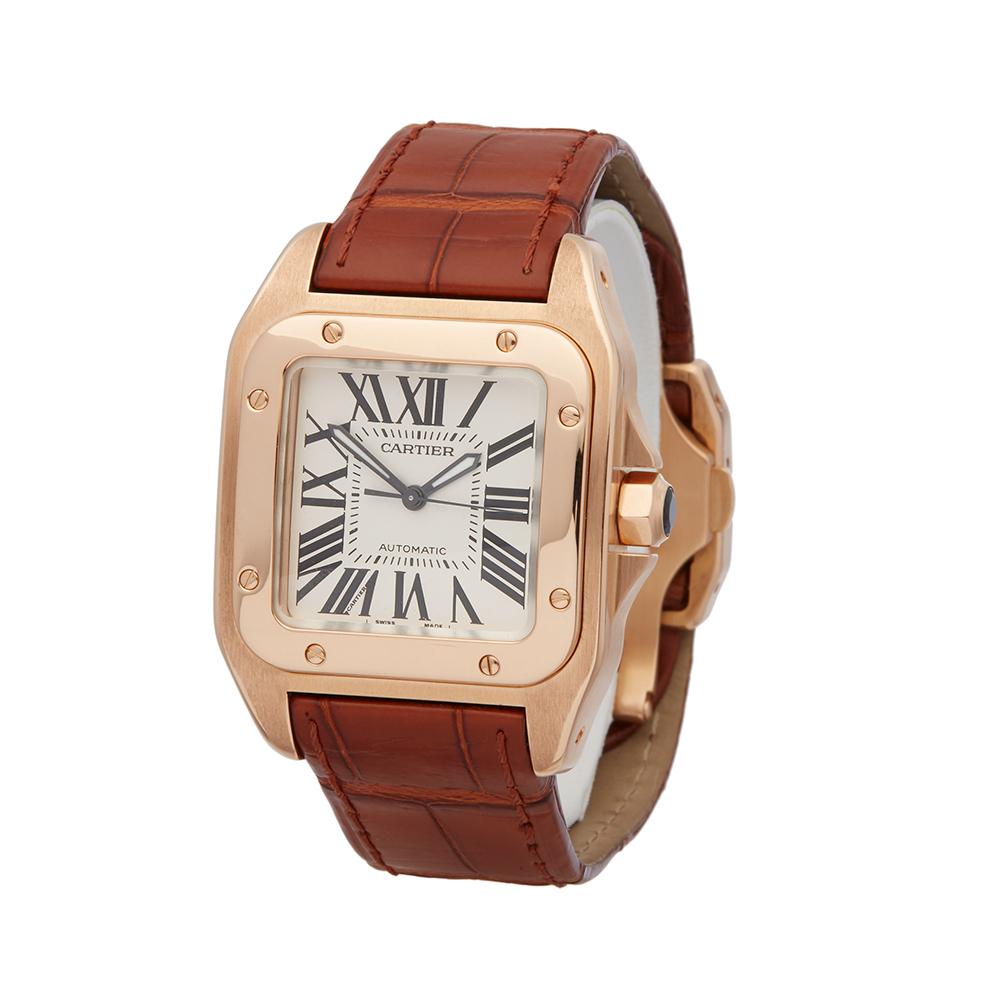 Contemporary 2010's Cartier Santos 100 Rose Gold 2879 Wristwatch
 *
 *Complete with: Box Only dated 2010's
 *Case Size: 33mm by 44mm
 *Strap: Brown Leather
 *Age: 2010's
 *Strap length: Adjustable up to 18cm. Please note we can order spare links and