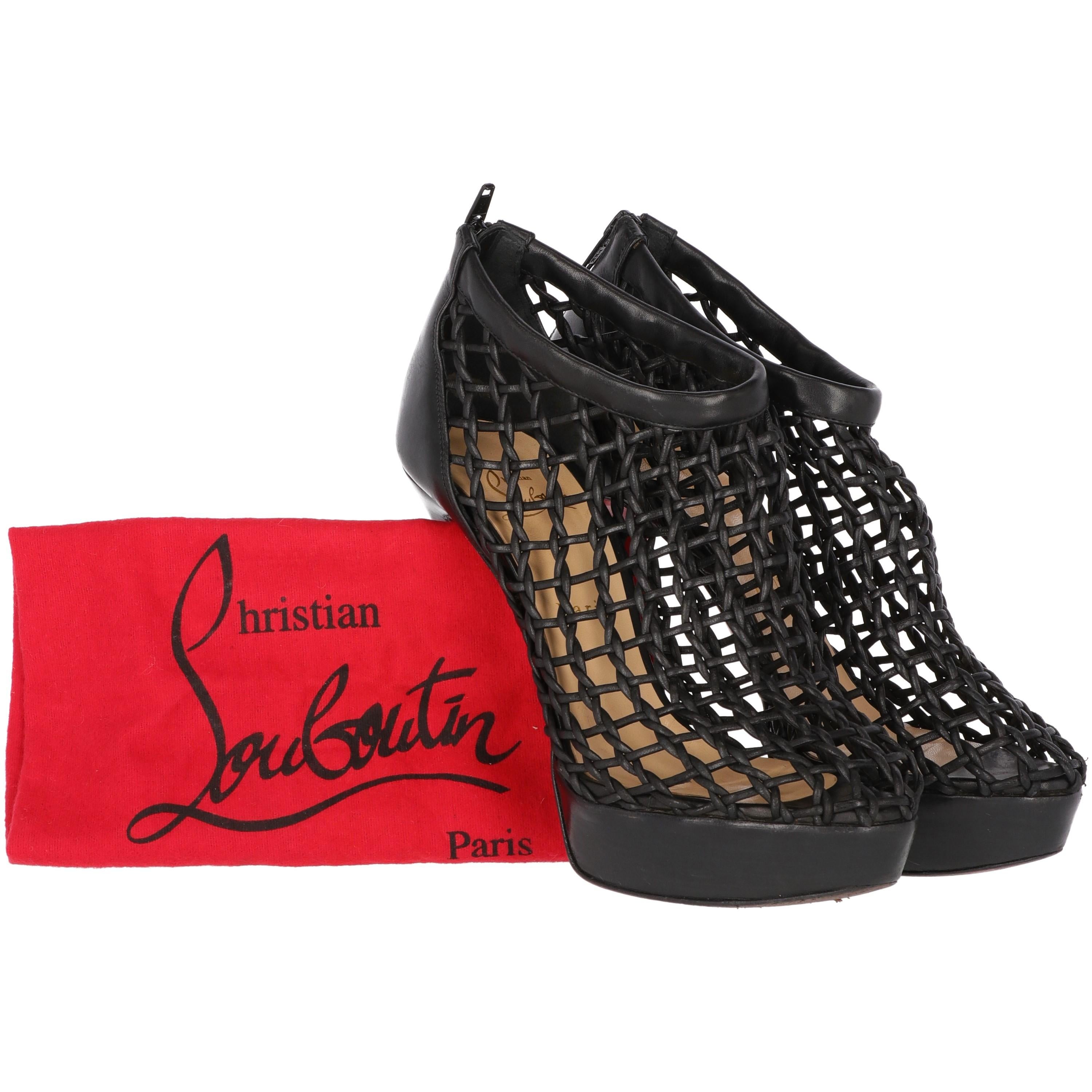 The stylish Christian Louboutin black braided leather pumps with 13 cm spike heels and 3 cm platform, feature a back zip fastening and round toes. With authentic dustbag, the item shows lightly scratches on the heels and platforms, as shown in the