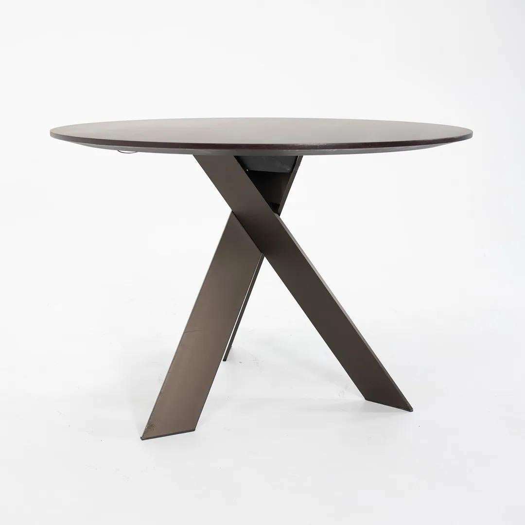 Steel 2010s Ekko Round Dining Table in Dark Oak by Wolfgang Mezger for Davis For Sale