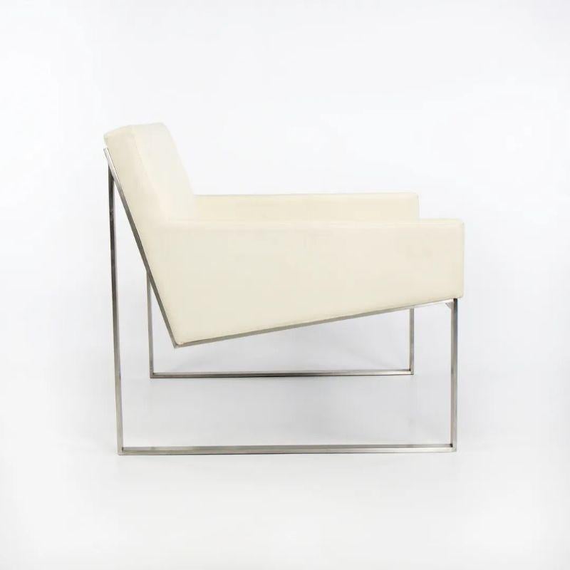 Listed for sale is a single Fabien Baron for Bernhardt Design B.3 lounge chair with arms in white leather. This chair was produced circa mid 2010s and has been lightly used. It's in gorgeous condition and was part of an executive suite in New York.