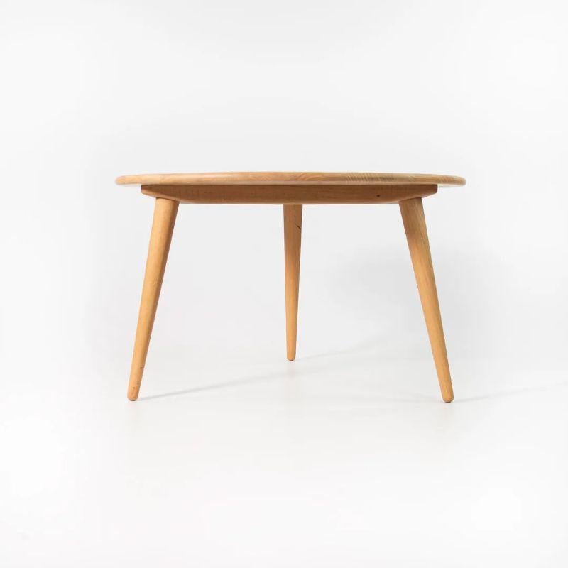 This is a single 2010s production CH008 Coffee Table designed by Hans Wegner and produced by Carl Hansen in Denmark. It appears to be the lacquered finish over oak. 

This example measures 34.7 inches in diameter with a height of 20.5 inches.