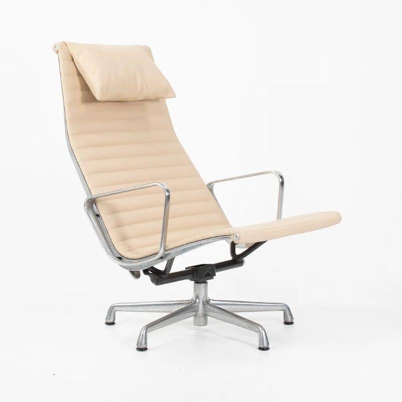 2010s Herman Miller Eames Aluminum Group Lounge Chair and Ottoman Tan Leather In Good Condition For Sale In Philadelphia, PA