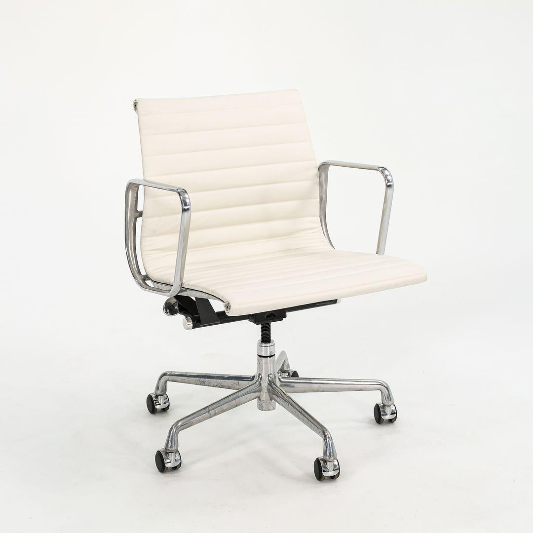 This is an Eames Aluminum Group Management Desk Chair, designed by Charles and Ray Eames for Herman Miller in 1958. This particular chair was produced in the 2010s. The listed price includes one chair, and we have four available for purchase in this