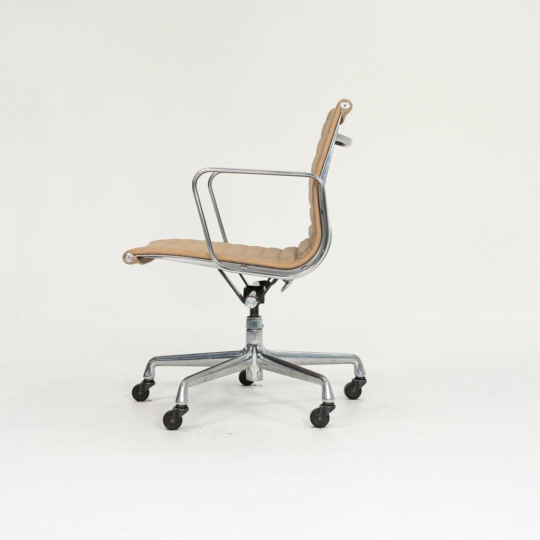 This is an Eames Aluminum Group Management Desk Chair, designed by Charles and Ray Eames for Herman Miller in 1958. This particular chair was produced in the 2010‚Äôs. The design sports a solid yet lightweight aluminum frame and is extremely
