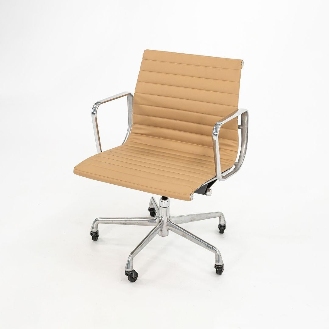 This is an Eames Aluminum Group Management Desk Chair, designed by Charles and Ray Eames for Herman Miller in 1958. This particular chair was produced in the 2010s. The design sports a solid yet lightweight aluminum frame, and is extremely