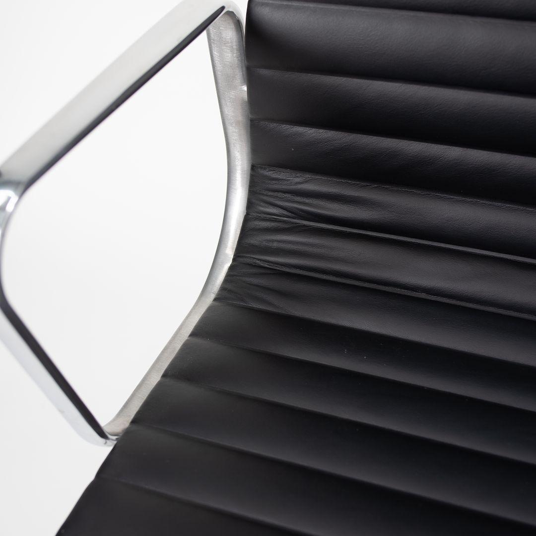 This is a single (multiple chairs are available, though sold individually) Eames Aluminum Group Management Desk Chair, designed by Charles and Ray Eames for Herman Miller in 1958. This particular chair was produced circa 2010s. The design sports a