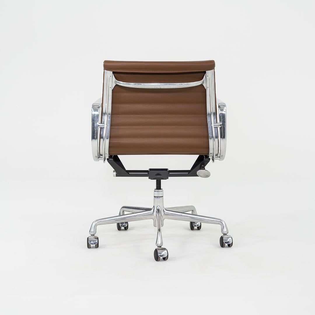 2010s Herman Miller Eames Aluminum Management Desk Chair Chocolate Brown Leather In Excellent Condition In Philadelphia, PA