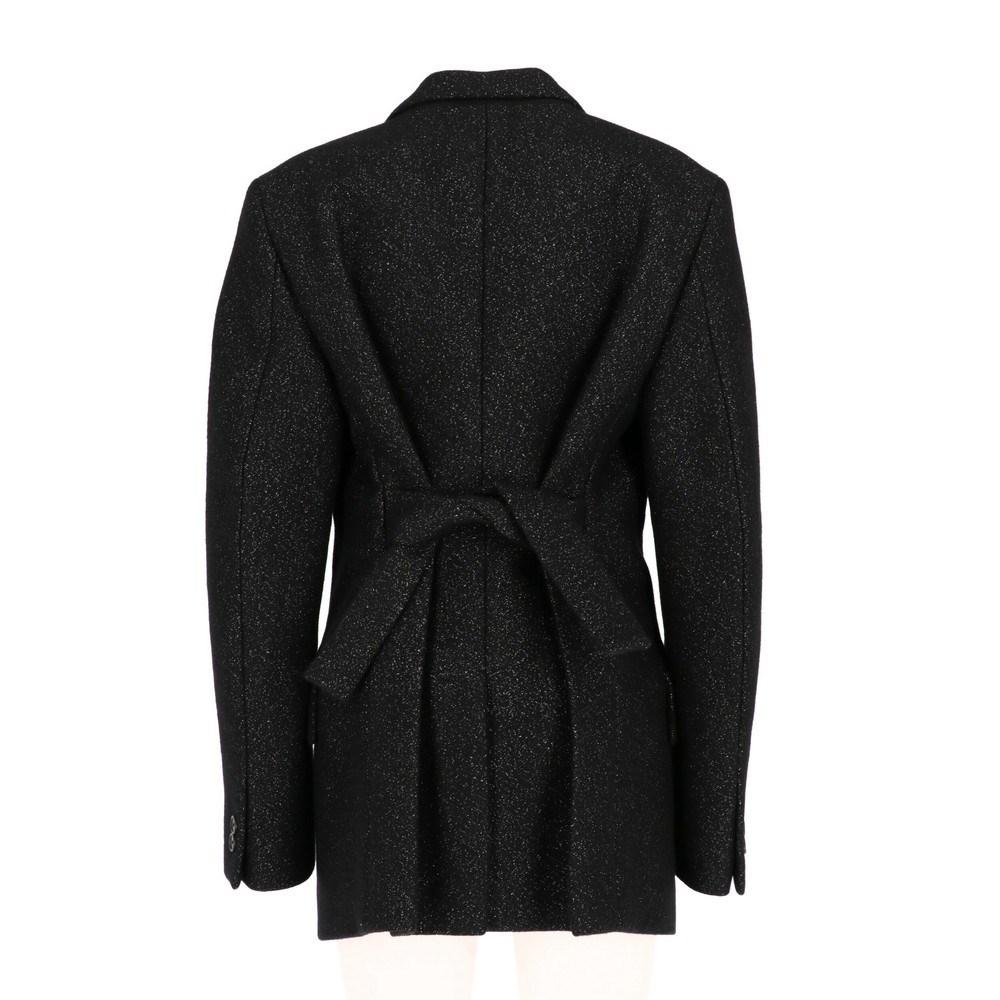 Jil Sander melange black wool blend jacket. Classic lapel collar, central closure and back bow. Long sleeves, padded shoulder straps and buttoned cuffs.

Size: 34 FR

Flat measurements
Height: 84 cm
Bust: 43 cm
Shoulders: 42 cm
Sleeves: 67