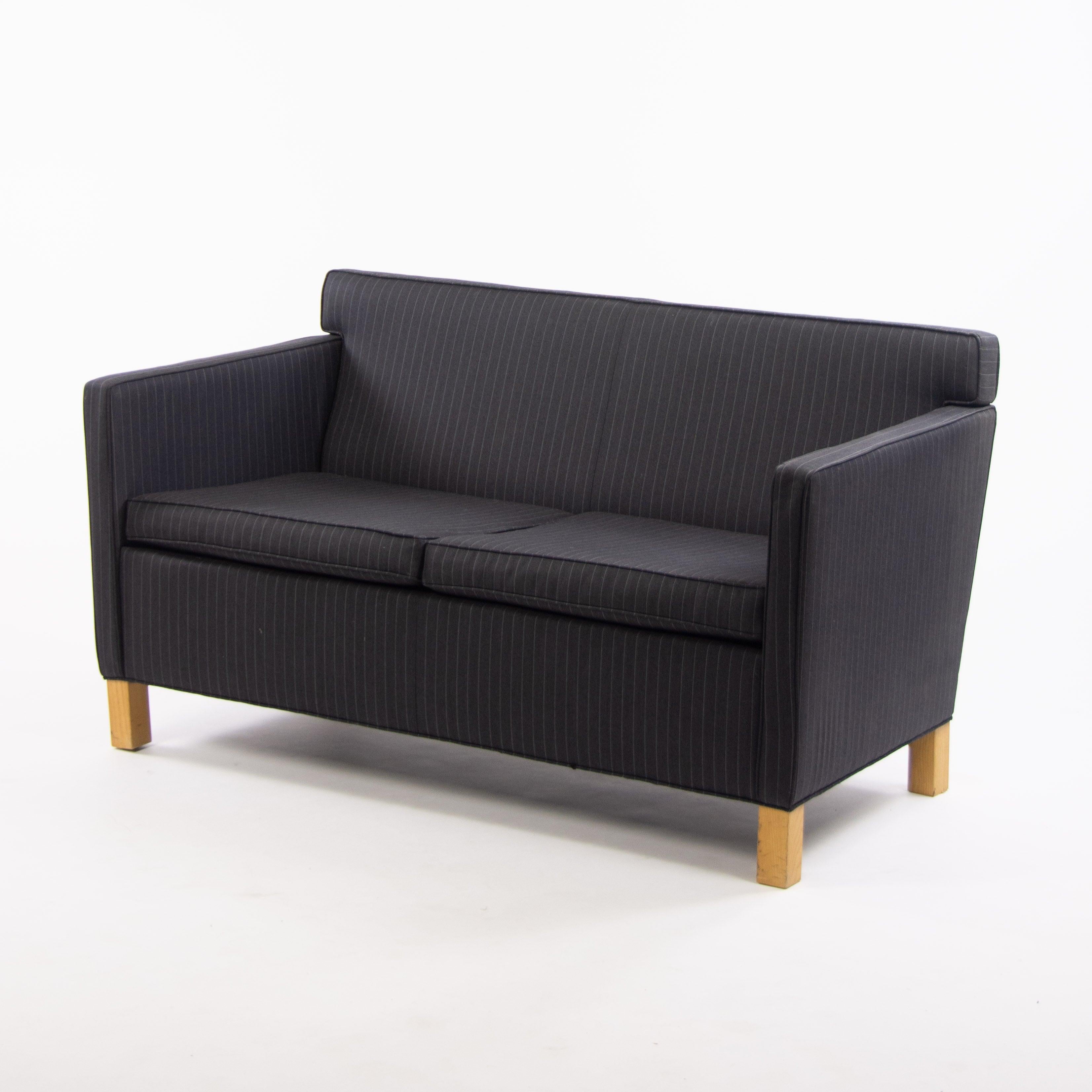 Listed for sale is a (sold separately) gorgeous and original Mies Van Der Rohe Krefeld Sofa, produced by Knoll.

Multiples of these two-seater sofas are available if desired in identical black fabric. Please inquire if interested in a