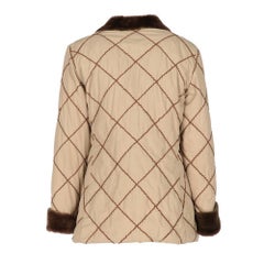 2010s Moncler’s goose down beige quilted coat with contrasting faux fur details