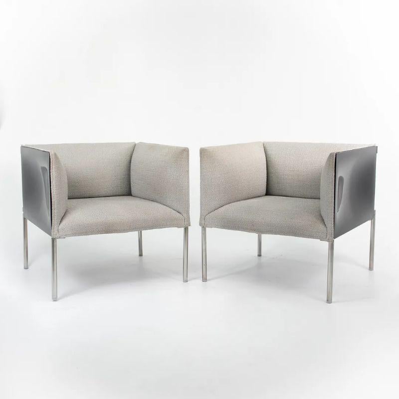 This is a pair of ‘Hollow’ Lounge Chairs, designed by Patricia Urquiola for B & B Italia in 2006. This particular pair was manufactured in Italy C. 2010. The listed price includes both chairs. The design features upholstered interior panels done in