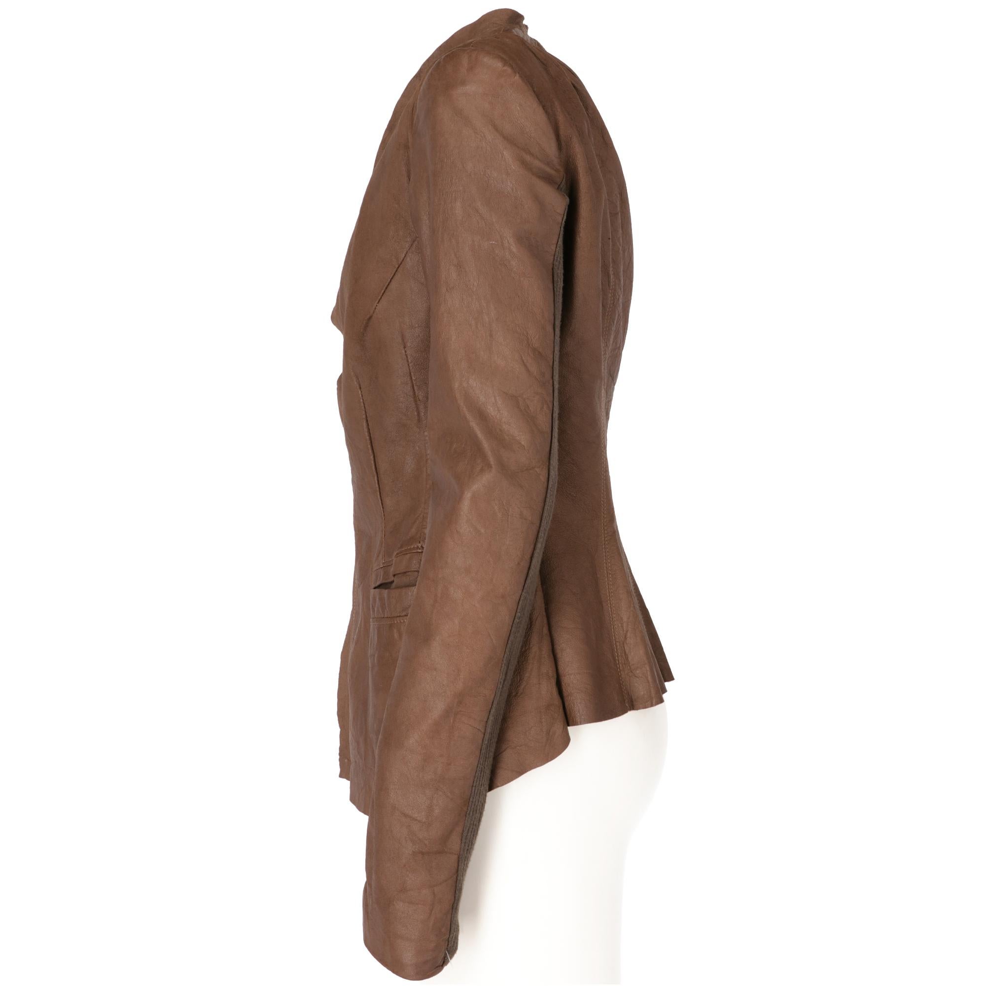 Rick Owens brown genuine leather jacket with a slightly flared cut, visible decorative stitching and raw-cut edges, front closure with hook, long sleeves with ribbed fabric insert, welt pockets, padded shoulder and semi lined interior with logoed