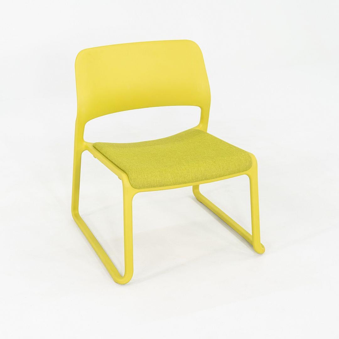 This is a set of four Spark Lounge Stacking Chairs, originally designed by Don Chadwick in 2009. These particular examples were produced in the 2010s. They are comprised of a polypropylene frame and have an upholstered seat. The listed price