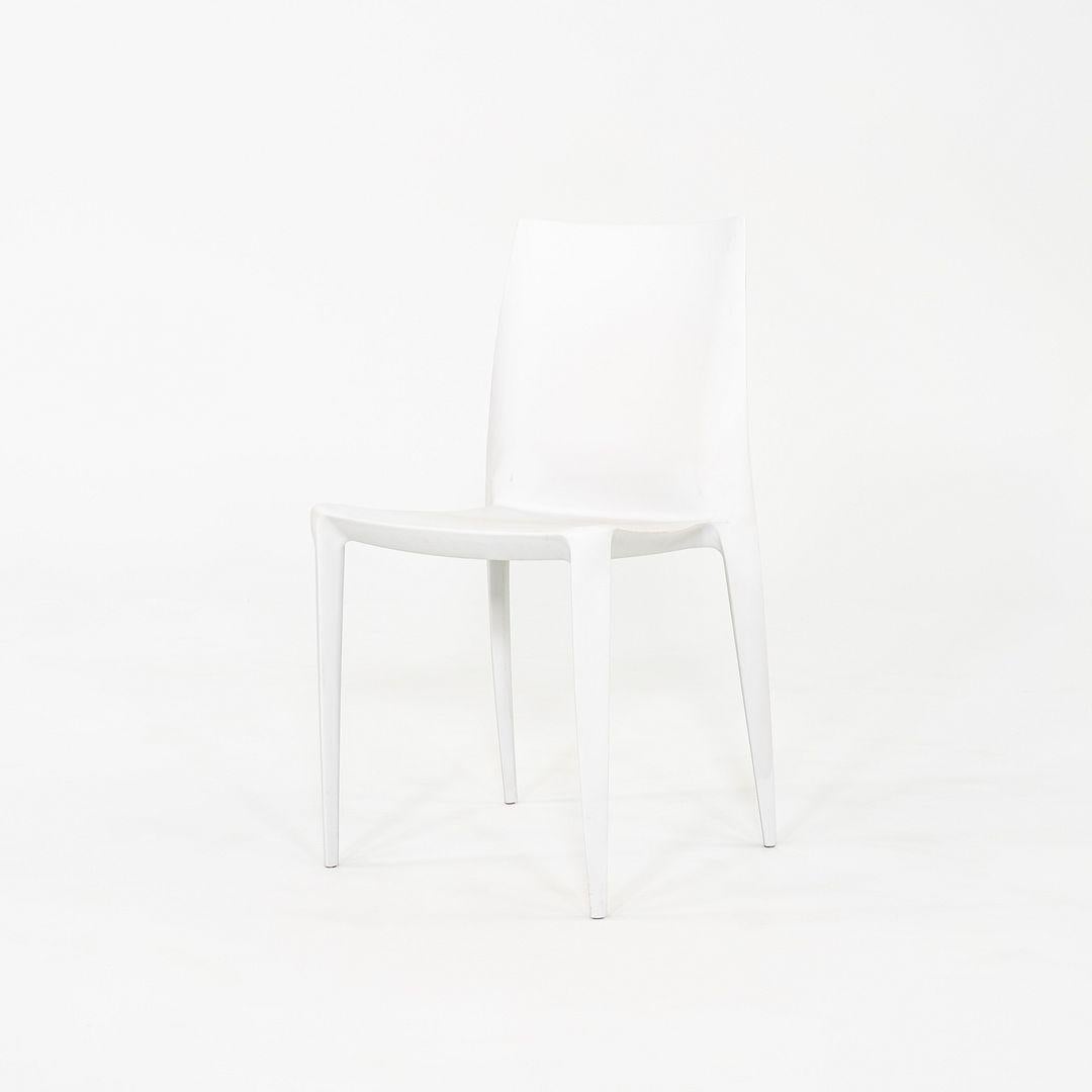 This is a set of six Bellini Chairs, originally designed by Mario Bellini in 1998. These particular examples were produced by Heller in Italy in the 2010s. They are comprised entirely of fiberglass reinforced polypropylene. 

The listed price