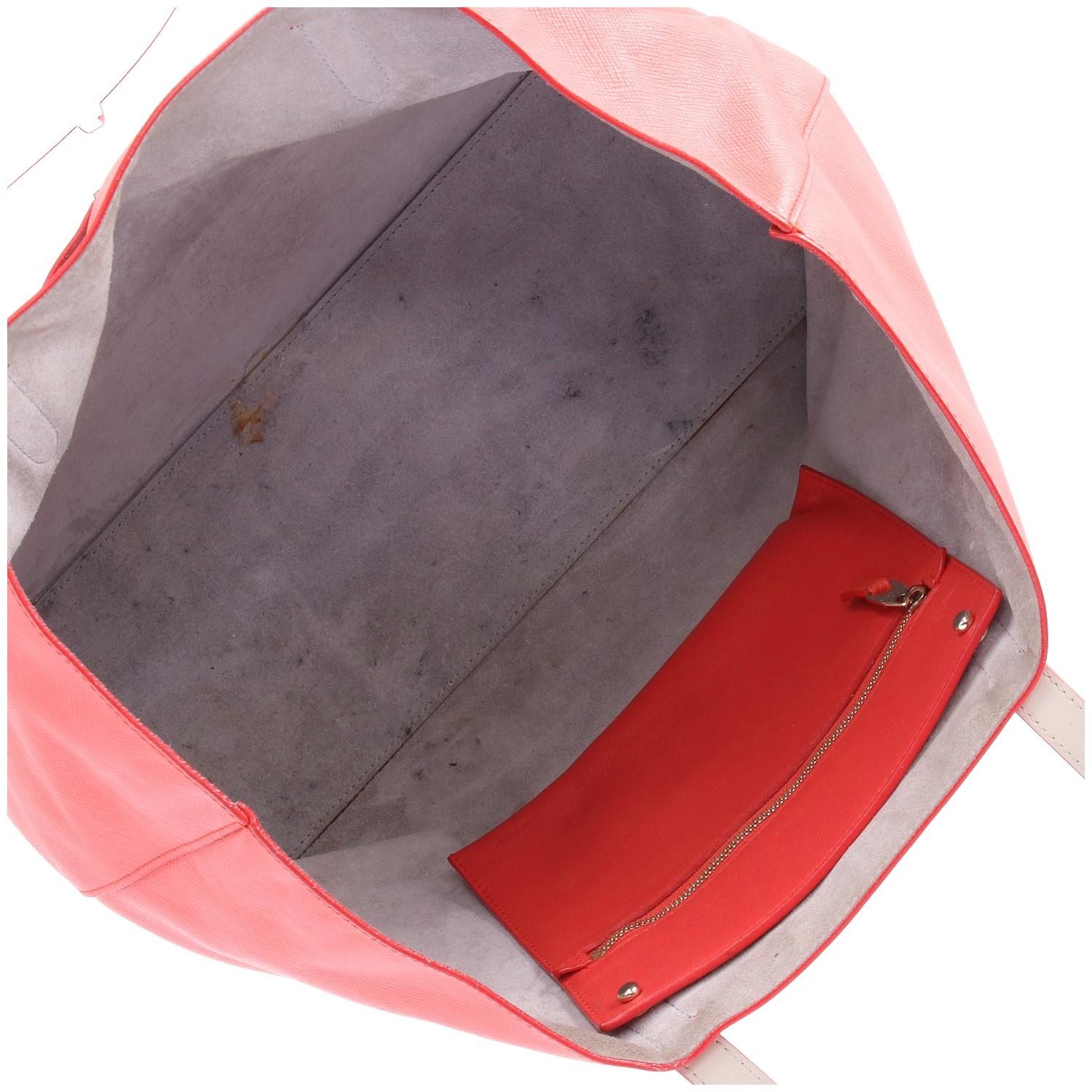 The elegant Smythson of Bond St. red crossgrain leather tote bag features front patch pocket, inner removable zipped pocket, beige suede lining, two handles, gold-tone front logo.
The bag shows stains at lining, as shown in the pictures. 
Years:
