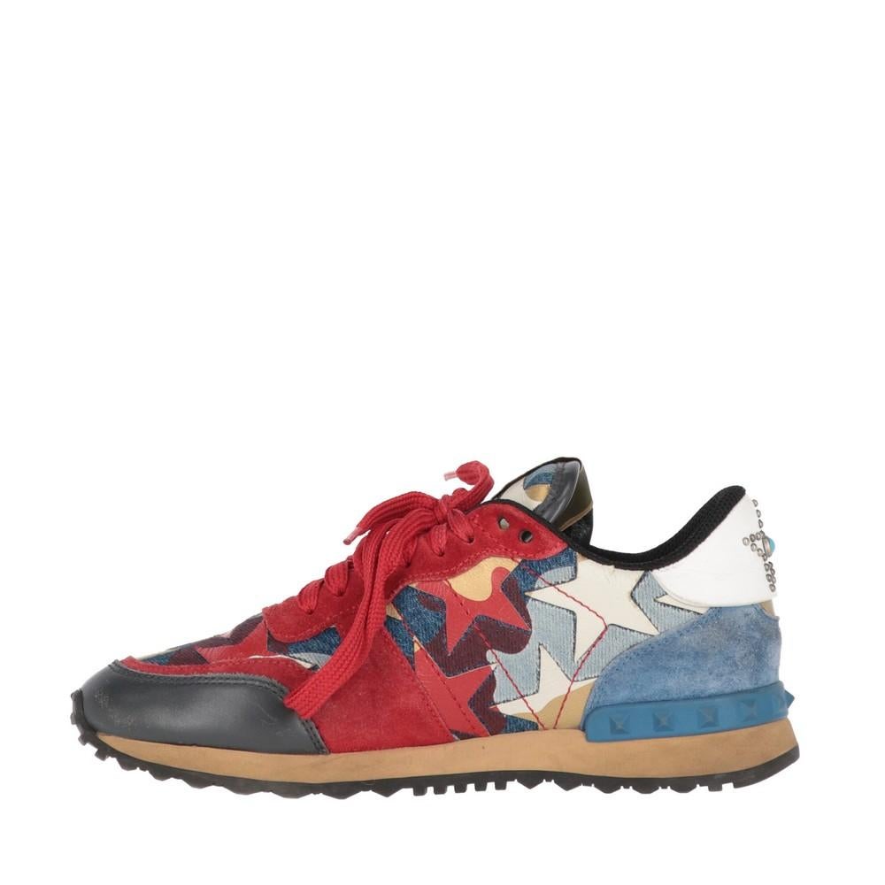 A.N.G.E.L.O. Vintage - ITALY
Valentino Garavani Rockrunner sneakers in leather, suede and fabric with red, blue camouflage pattern and beige details, rubber sole with rubber studs details.  

The shoes showed slight signs of wear, as shown in the