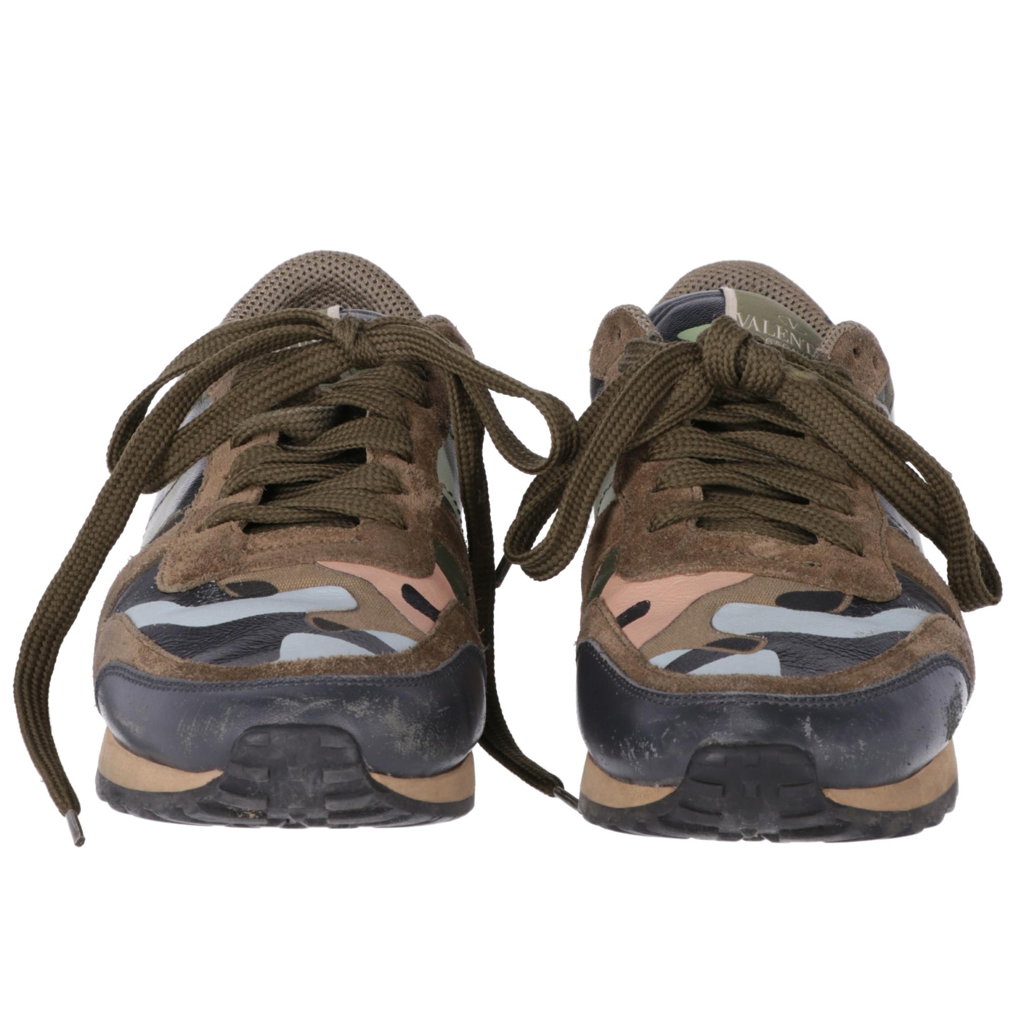 Valentino Garavani Rockrunner sneakers in leather, suede and fabric with mint green, dark green, pink and light blue camouflage pattern, rubber sole with rubber studs detail. Box and dust bag are included.

The shoes showed slight signs of wear as