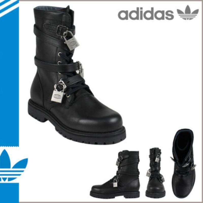 2011 Adidas Originals Jeremy Scott Combat Boots Black Three Keys Super Rare!

Additional Information:
Material: Upper 100% leather        
Color: Black
Style: Combat Boots        
Size: 9 US
Year Manufactured: 2011
100% Authentic!!!
Condition: Brand