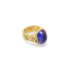 Susan Lister Locke 20.11 Carat Cabochon Tanzanite in 18K Gold Band with Diamonds