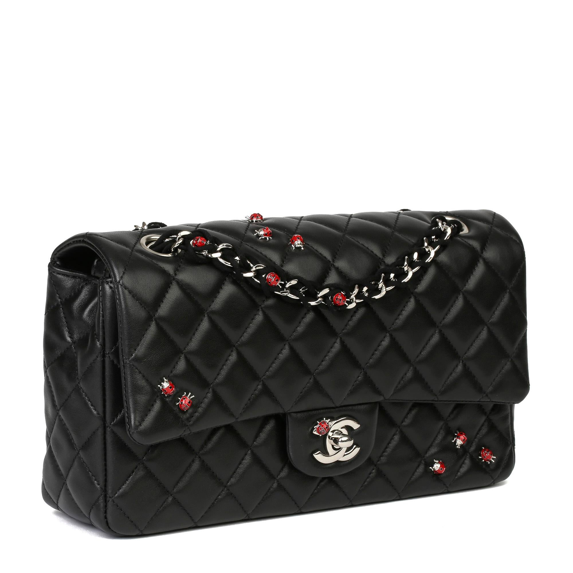 CHANEL
Black Quilted Lambskin Lady Bug Medium Classic Single Flap Bag

Xupes Reference: CB326
Serial Number: 14881705
Age (Circa): 2011
Accompanied By:  Authenticity Card, Care Booklet, Protective Felt
Authenticity Details: Serial Sticker,