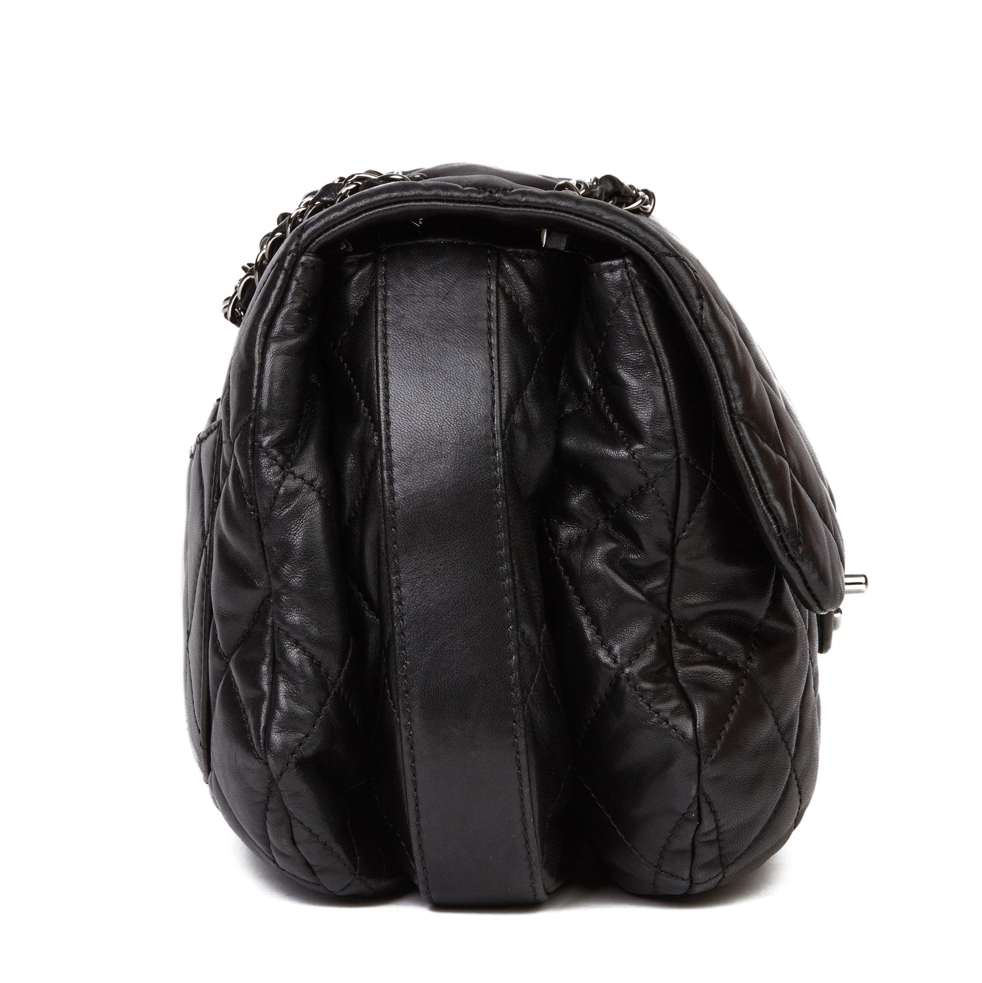 CHANEL
Black Quilted Lambskin Triple Compartment Classic Single Flap Bag

Xupes Reference: HB3656
Serial Number: 15358143
Age (Circa): 2011
Accompanied By: Chanel Dust Bag, Authenticity Card 
Authenticity Details: Authenticity Card, Serial Sticker