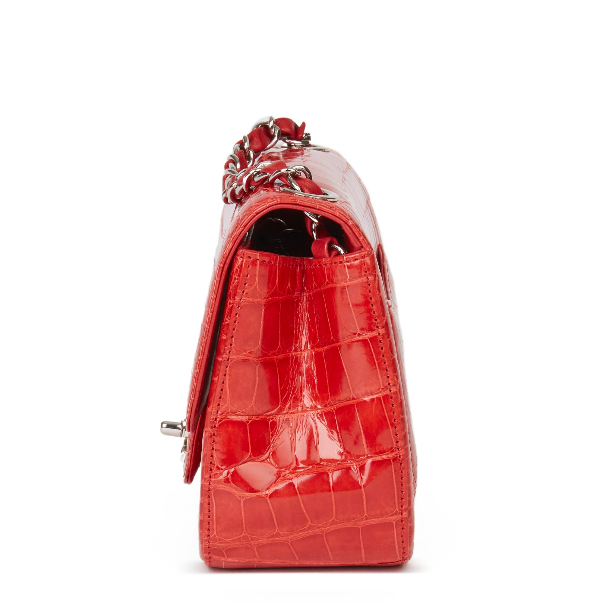 CHANEL
Red Shiny Mississippiensis Alligator Leather Mini Flap Bag 

Xupes Reference: HB3278
Serial Number: 15823632
Age (Circa): 2011
Accompanied By: Chanel Dust Bag, Authenticity Card
Authenticity Details: Serial Sticker (Made in France) 
Gender: