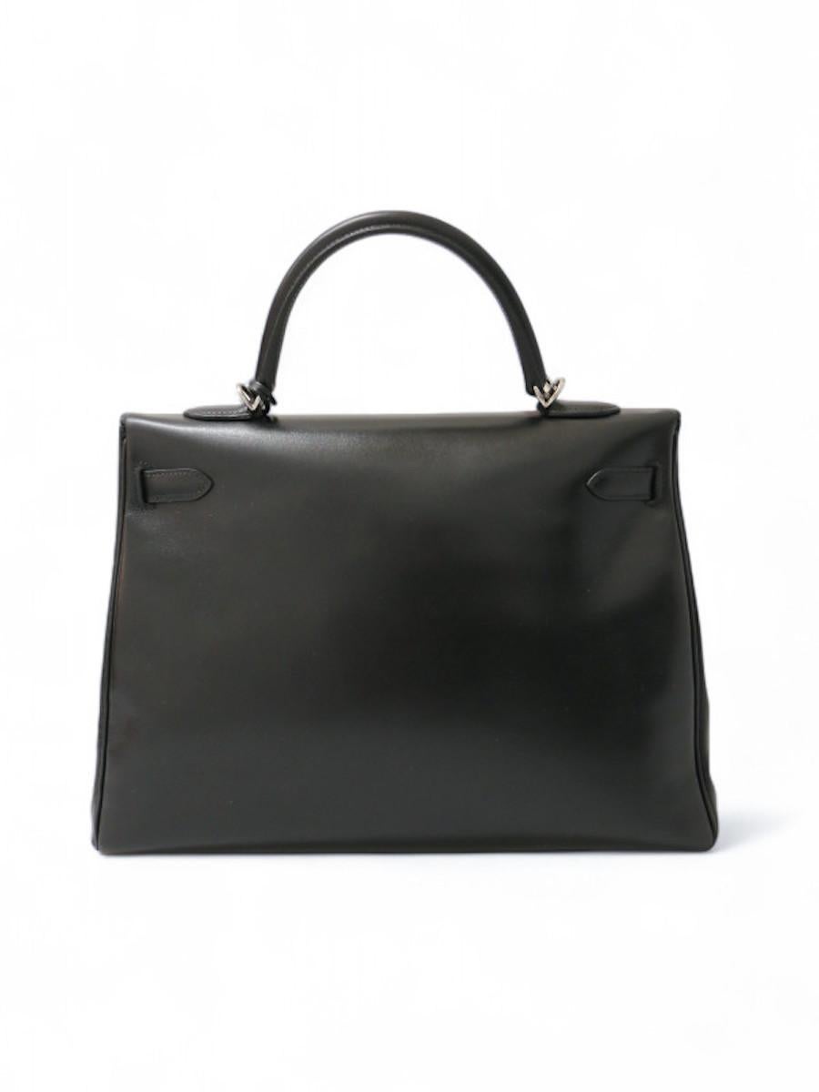 Femenino o masculino 2011 Hermès negro Kelly 35 caja cuero plata hardware en venta
