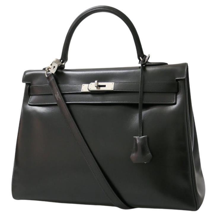 2011 Hermès negro Kelly 35 caja cuero plata hardware en venta