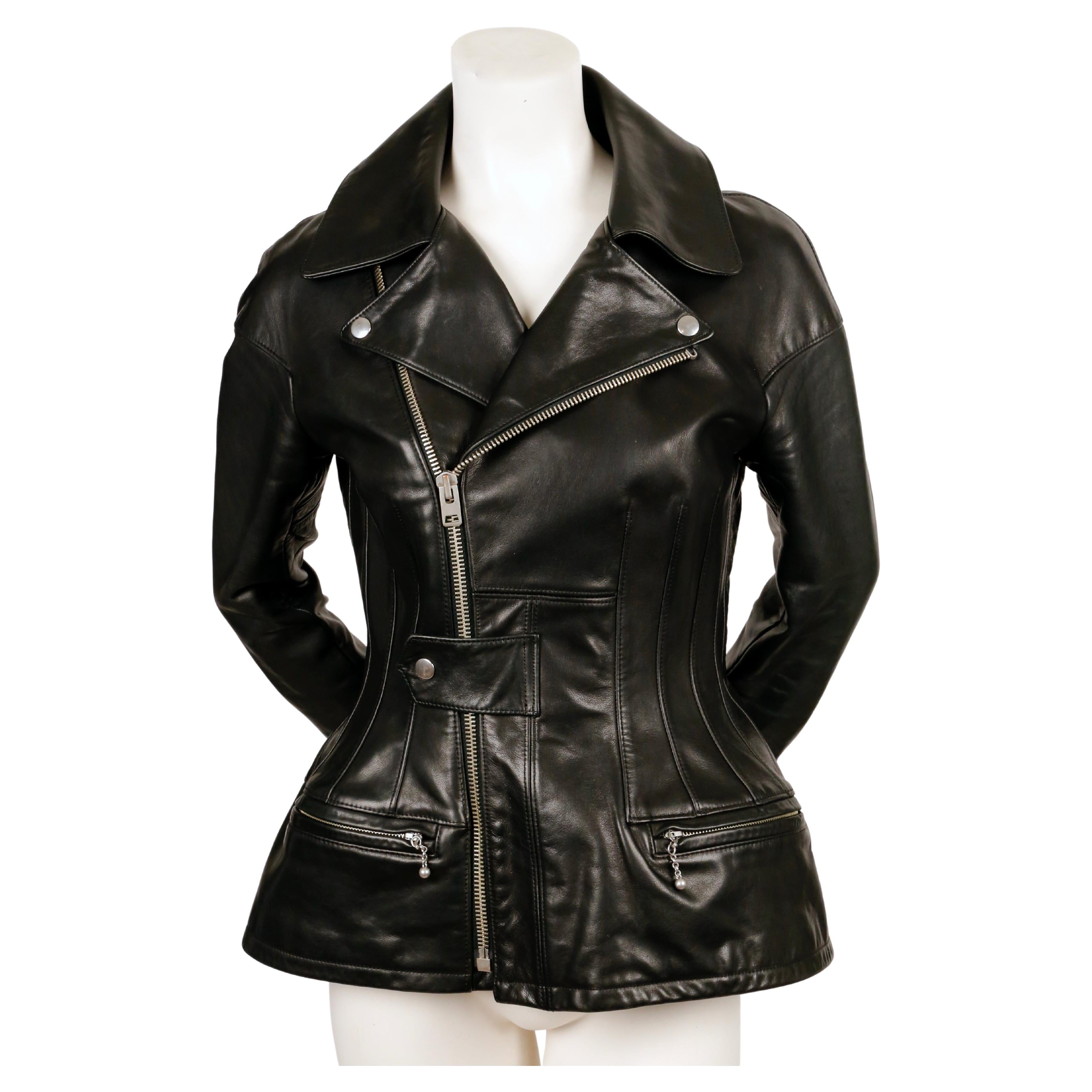 Black leather jacket with portrait collar, three-quarter sleeves and exaggerated peplum waist from Junya Watanabe for Comme des Garcons exactly as seen on the runway for fall 2011. Size M however this fits more like a S. Approximate measurements: