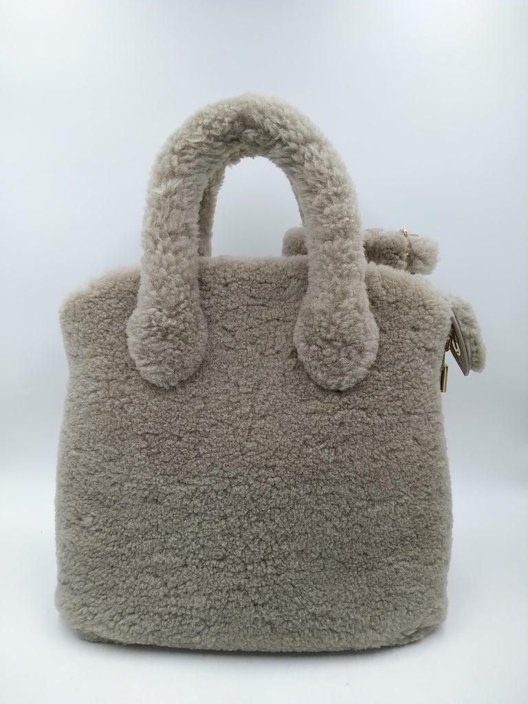 2011 Louis Vuitton Grey Shearling Pulsion Lockit bag For Sale 7