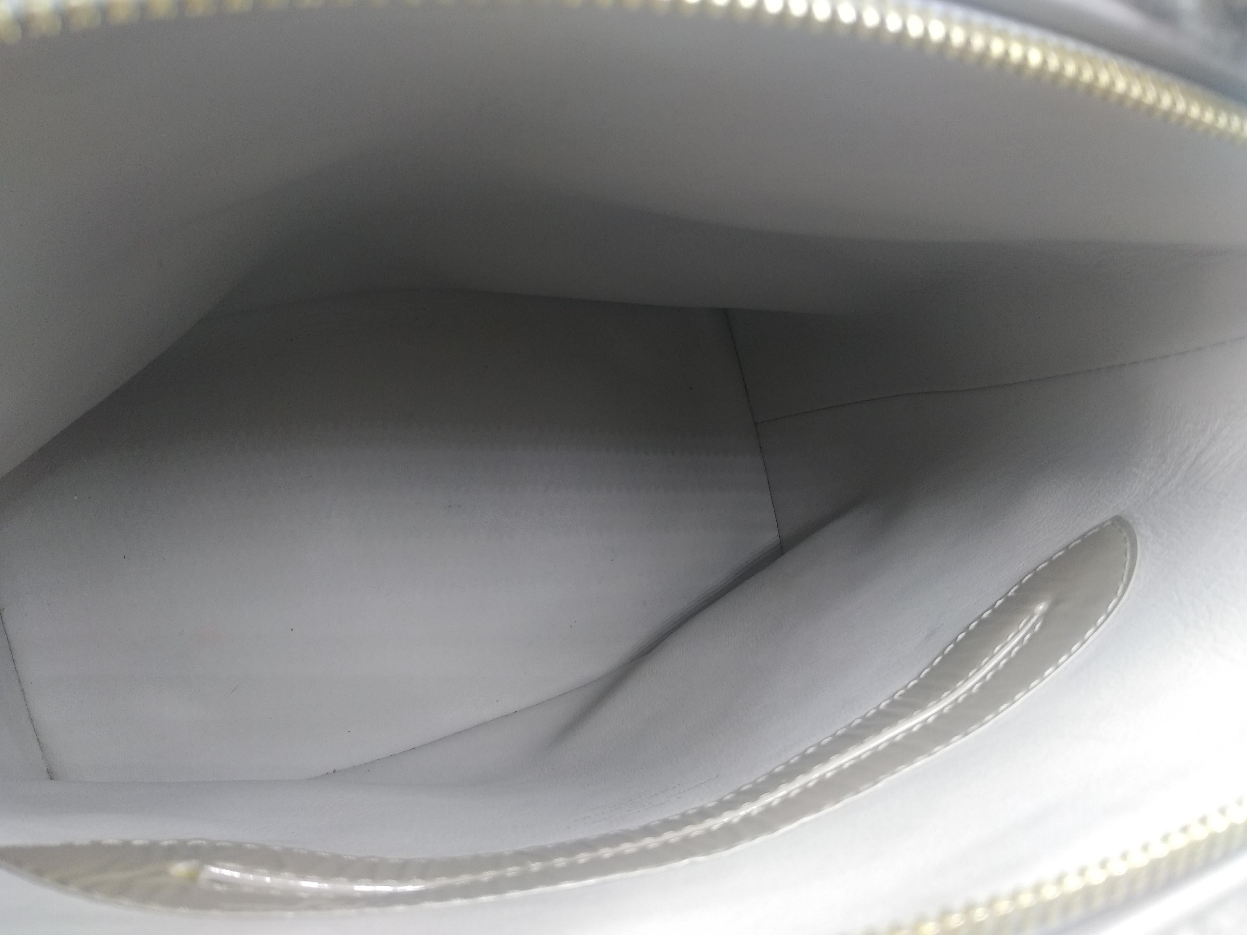 2011 Louis Vuitton Grey Shearling Pulsion Lockit bag In Excellent Condition For Sale In Lugano, Ticino