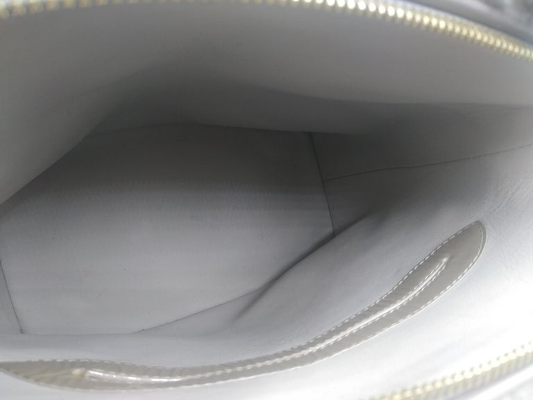 2011 Louis Vuitton Grey Shearling Pulsion Lockit bag For Sale 2