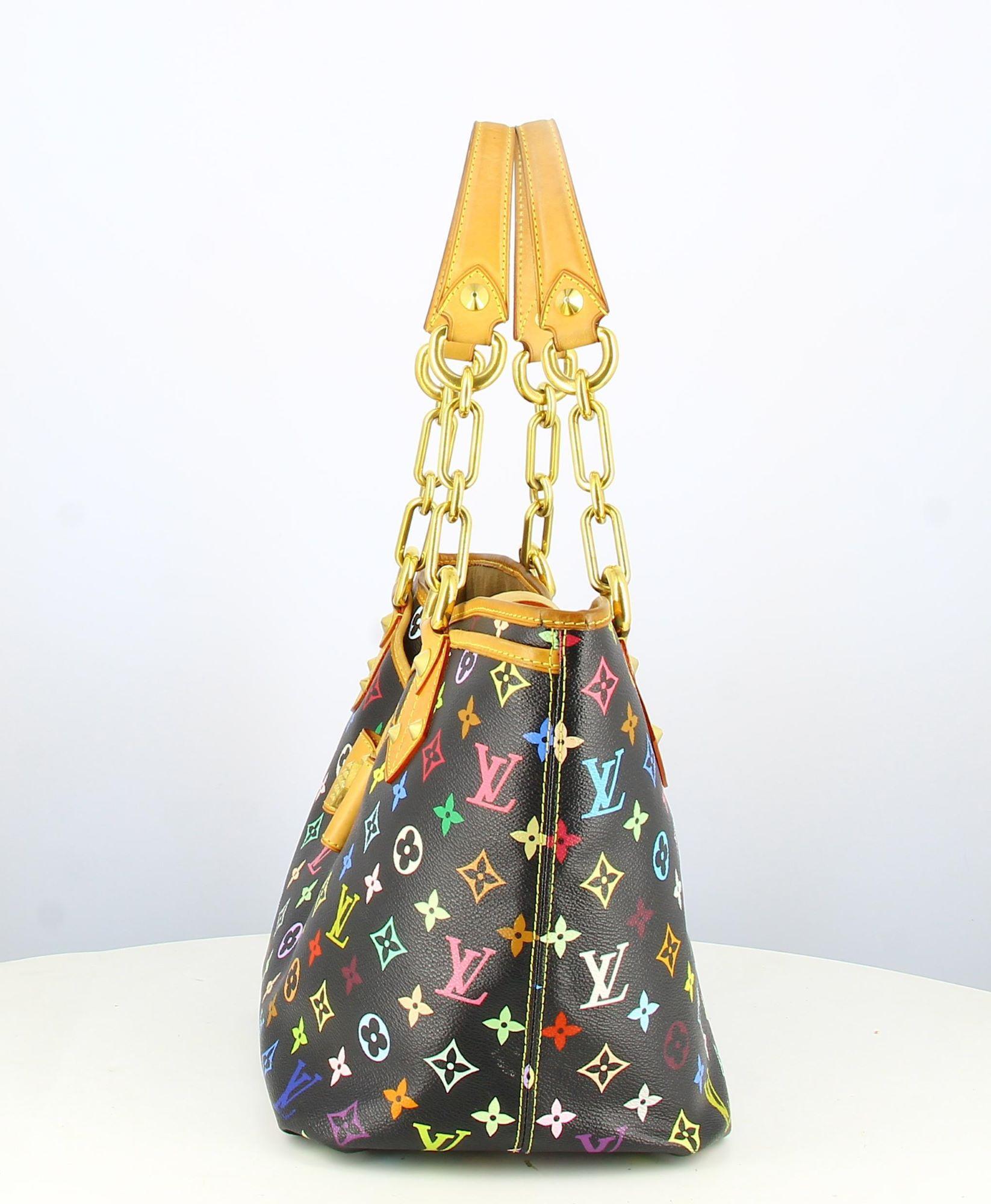2011 Louis Vuitton x Takashi Morakami Handbag Monogram multicolor

- Good condition. Shows slight traces of wear over time.
- Louis Vuitton Handbag, monogram multicolor
- Brown leather hanses
- Multicolour logo. Pocket on the front.
- Interior:
